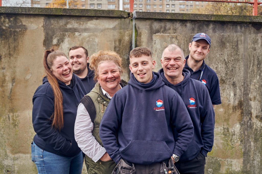 Team of Copley Pest Solutions staff wearing branded jumpers